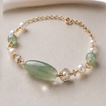 Elongated Green Jade Bead Bracelet with Pearls in Gold Tone